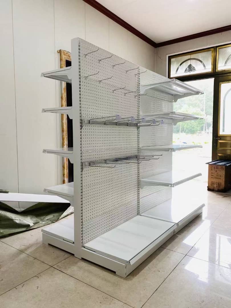Installed wall bay shelving in a fully stocked retail shop