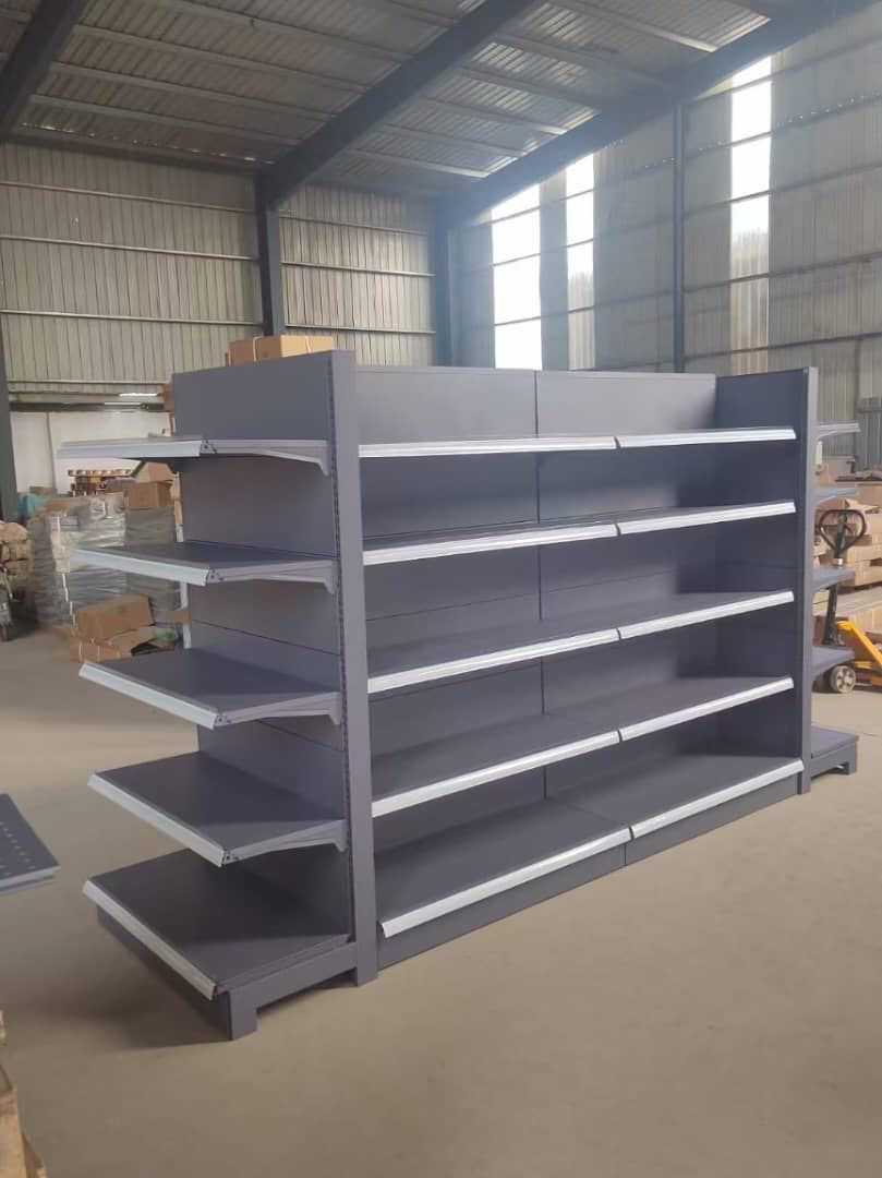 Wall shelving and shop display units in a convenience store interior